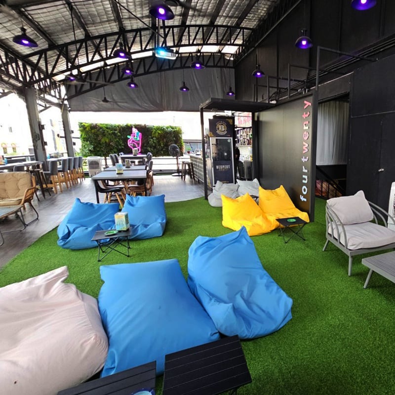High Garden rooftop lounge by FOURTWENTY with turf seating and an open-air bar layout.